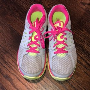 Nike pink, lime green and grey sneakers.  Size 8.